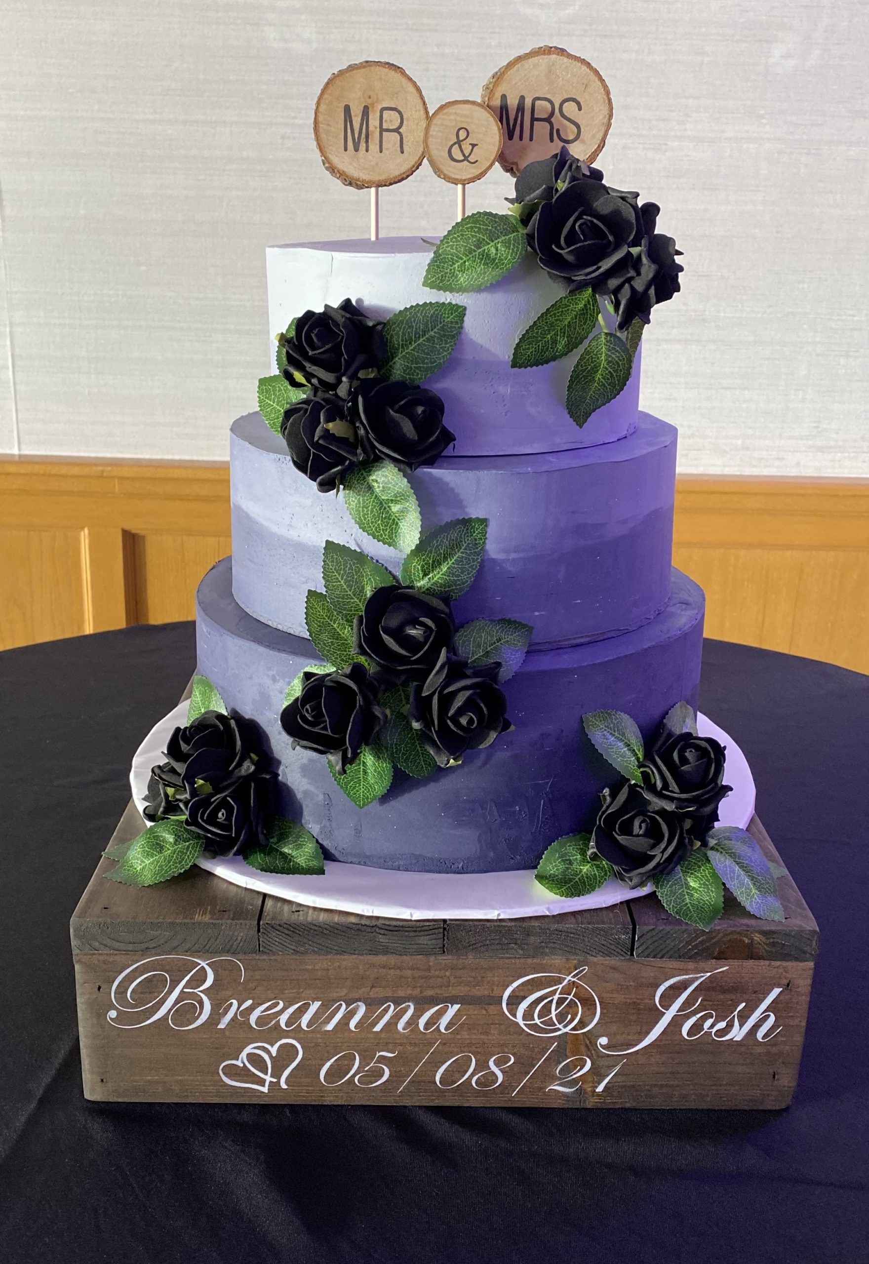 A beautiful 3-tier custom hombre wedding cake with buttercream flowers from Village Patisserie in Toledo, Ohio